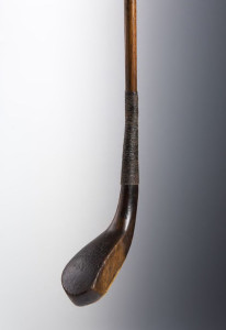 A Mungo Park longnose putter- the beech head with horn insert to sole, lead counterweight, the hickory shaft stamped Patrick, Leven
